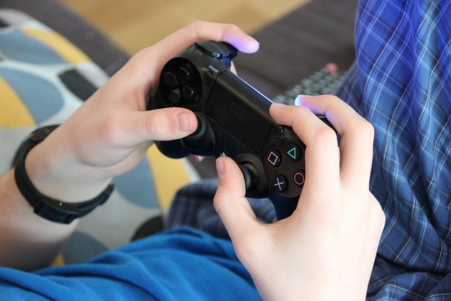 person playing in xbox